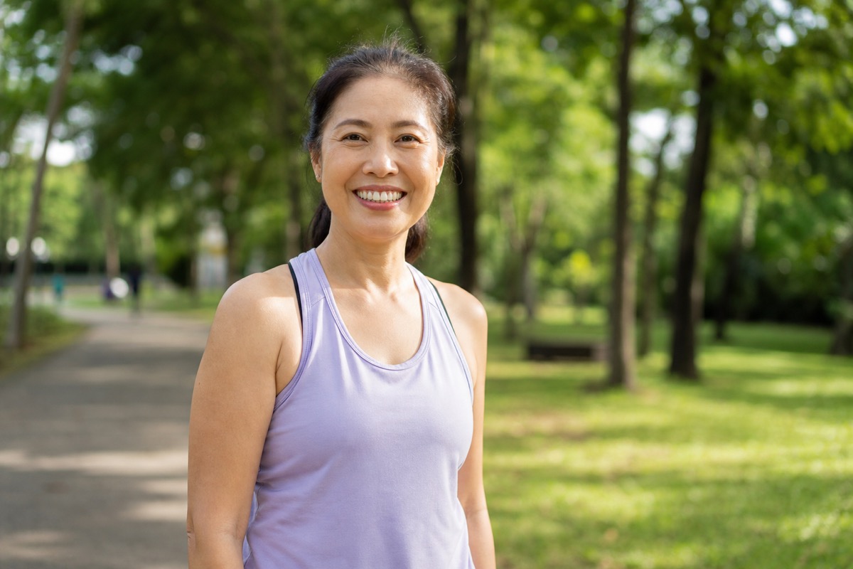 Healthy woman maintaining weight loss in Singapore park